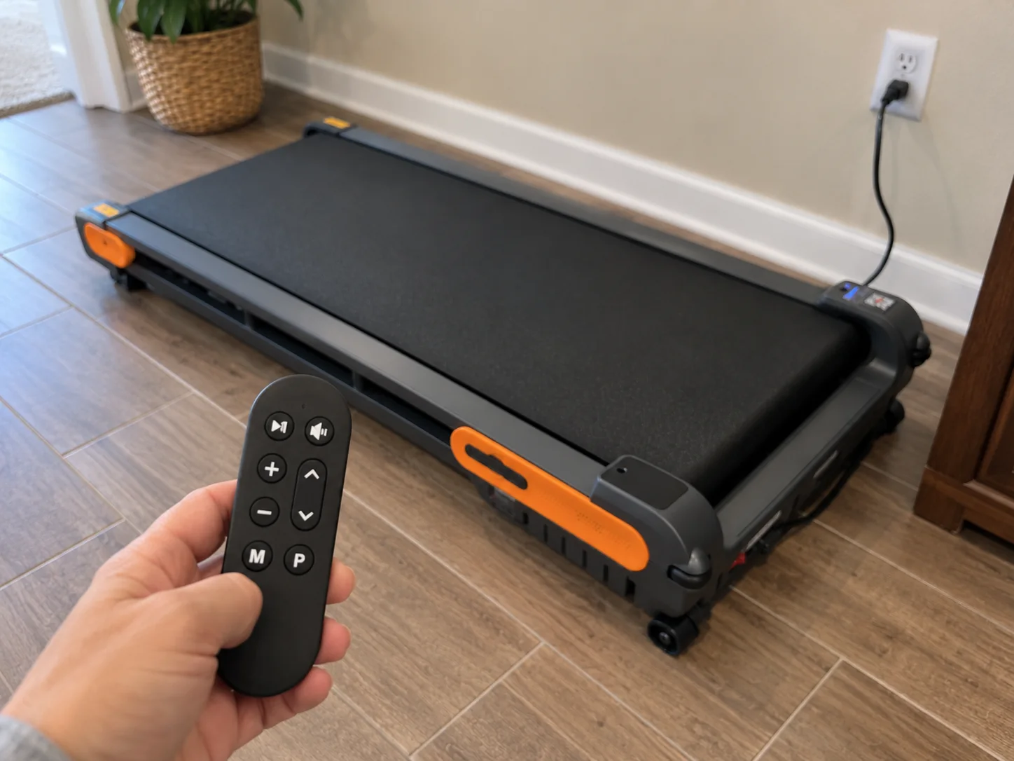 Remote control shown with the VITALWALK Apollo 11 Vibe-style walking pad